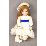 A large Simon and Halberg bisque head doll with blue sleeping eyes, mohair wig, jointed