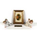 A 19th century silk portrait of a young woman in a later frame together with a painted glass slide
