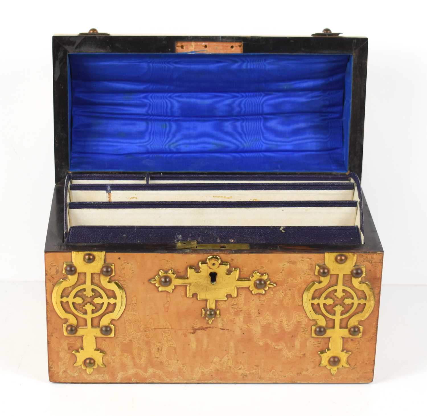 A Victorian burr walnut domed stationary box, with brass strapwork mounts and fitted interior,