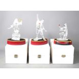 Three boxed Swarovski figures, Columbine, Pierrot and Harlequin, all with stands.