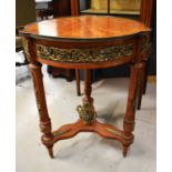 A 19th century style French occasional table with parquetry top and gilt metal mounts.