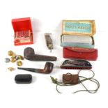 A group of collectable items to include a smoking pipe with silver collar, British Rail buttons,