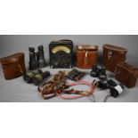 A WWII Air Ministry AvoMeter, together with various pairs of binoculars, some military including a