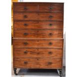 A Georgian mahogany chest on chest with two short over six long graduated drawers bearing decorative