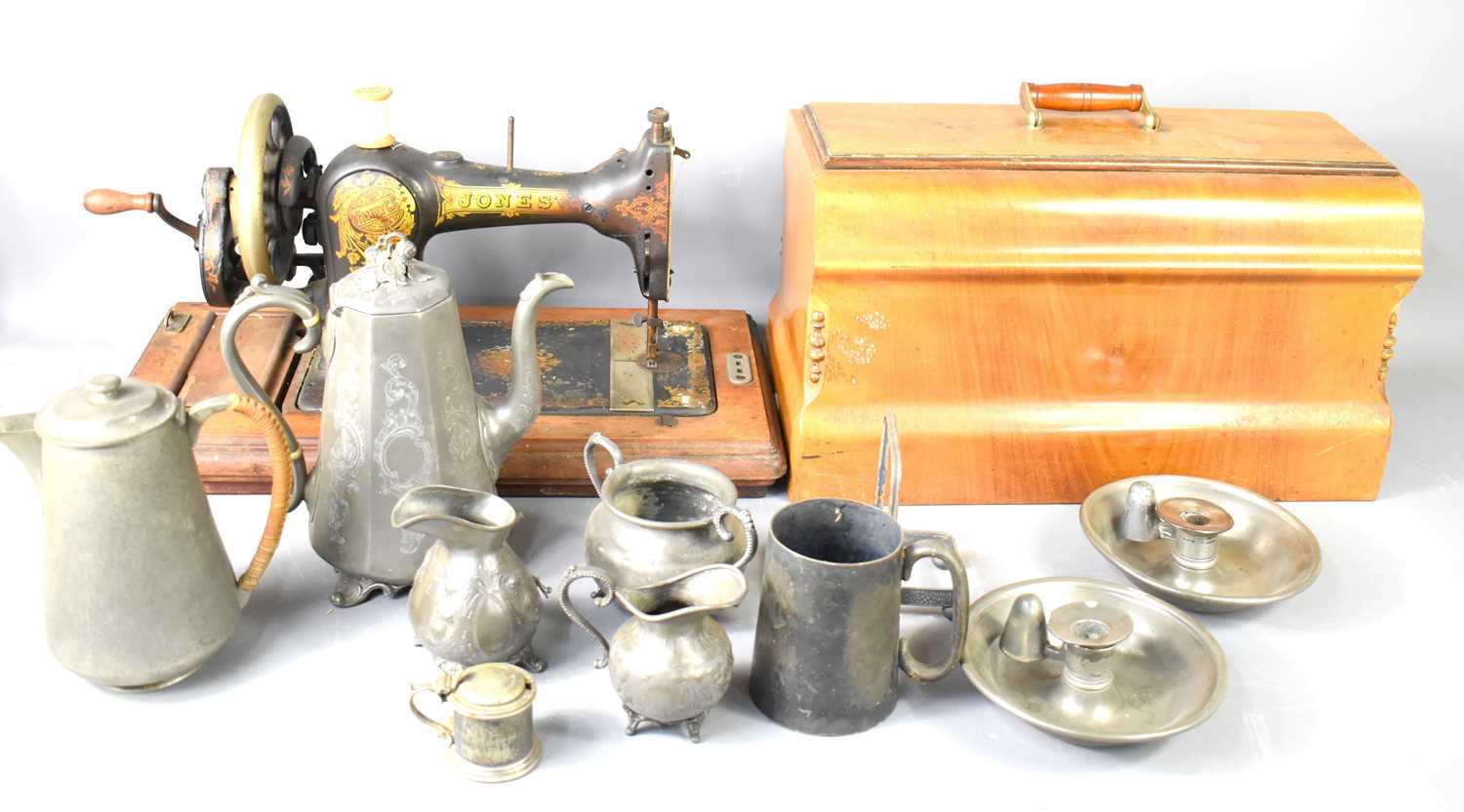 A quantity of Pewter ware to include a pair of chambersticks and coffee pot together with a
