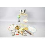 A mixed group of assorted curios and collectables, to include a globe and a pull-along cow.