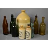 A group of vintage glass and stoneware bottles all for Bullard and Sons of Norwich, including a