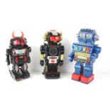 Three vintage battery operated robots to include New Bright 2002 robot made in 1984, Kingsway