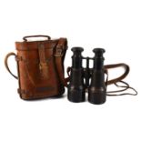 A pair of WWI era binoculars the eye pieces marked Lemaire Fabt Paris and the tubes marked with