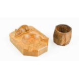 A Robert 'Mouseman' Thompson ashtray and napkin ring, both carved with signature mouse.