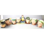 A Staffordshire type pottery figure modelled as Daniel Lambert and a group of Royal Doulton and