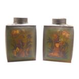 A pair of 19th century Japanned Toleware tea canisters by John A Gilbert, decorated in gilt with