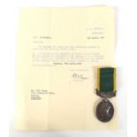 A George VI Territorial Efficiency medal awarded to Pte R.E Mock, 5614215, Devonshire Regiment, with