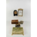 A group of vintage items to include two clocks, an alabaster box, an inlaid wooden box containing