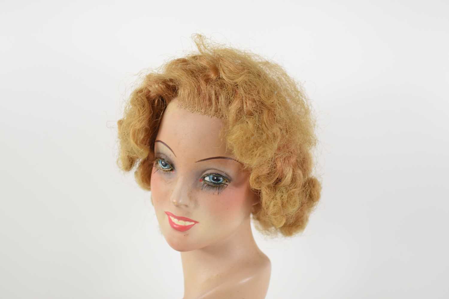 An Art Deco style terracotta bust of a women raised on a shaped base, 36cm high. - Image 2 of 5