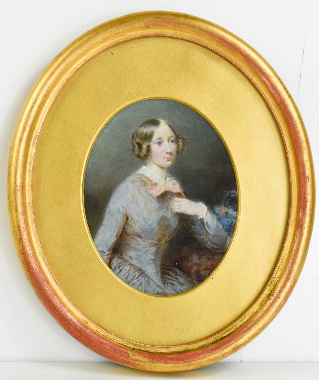 A 19th century oval framed miniature of a lady, framed and glazed, 16 by 8cm.