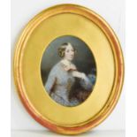 A 19th century oval framed miniature of a lady, framed and glazed, 16 by 8cm.