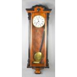 A Vienna mahogany wall clock, subsidiary second dial, enamel face, with pendulum and weights,