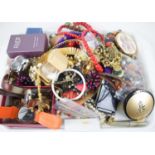 A group of costume jewellery to include necklaces, various beads, earrings, watches, brooches,