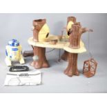 A vintage Star Wars Ewok village, together with a Palitoy radio controlled R2-D2 1979 with