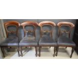 A set of four Victorian mahogany dining chairs, with blue velvet seats.
