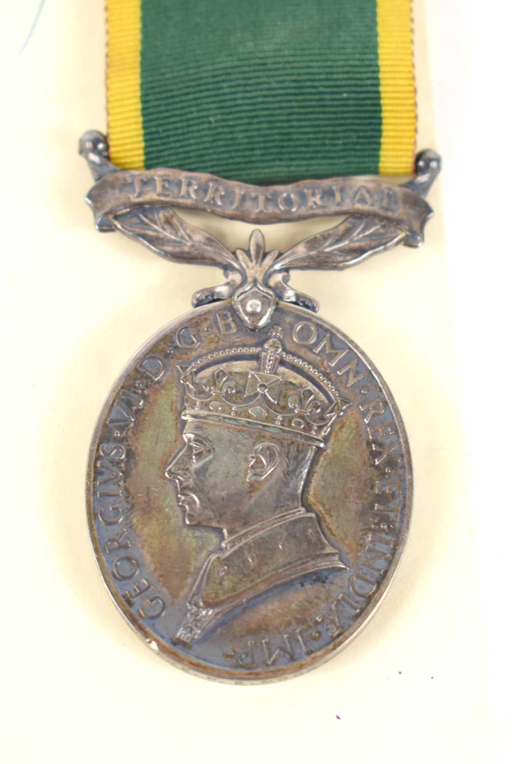 A George VI Territorial Efficiency medal awarded to Pte R.E Mock, 5614215, Devonshire Regiment, with - Image 2 of 2
