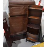 Two vintage metal travelling trunks, a wooden chest and an oak set of shelves, and a three tier cake