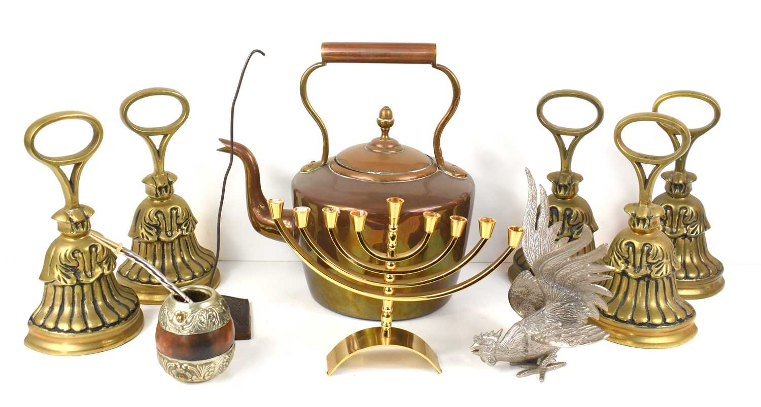 A group of five country house style brass door porters, together with copper kettle, brass menorah