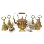 A group of five country house style brass door porters, together with copper kettle, brass menorah