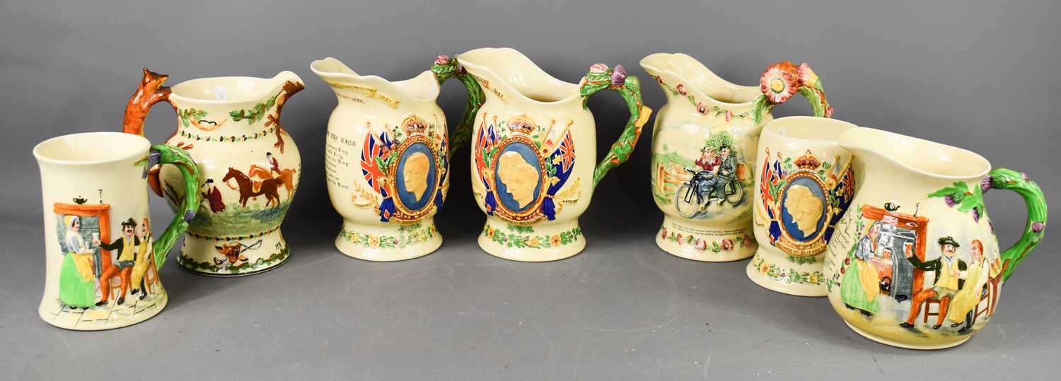 A group of Crown Devon commemorative and musical jugs, to include Auld Lang Syne, Edward VIII and