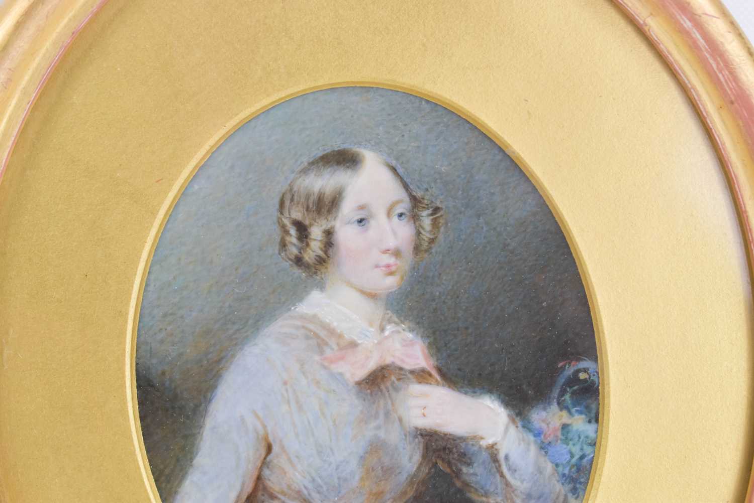A 19th century oval framed miniature of a lady, framed and glazed, 16 by 8cm. - Image 2 of 2