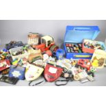 A large group of vintage toys to include star wars figures, two Tomytronic electronic games, Topps