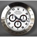 A Rolex Oyster Perpetual kitchen wall clock, modern, 34cm diameter.