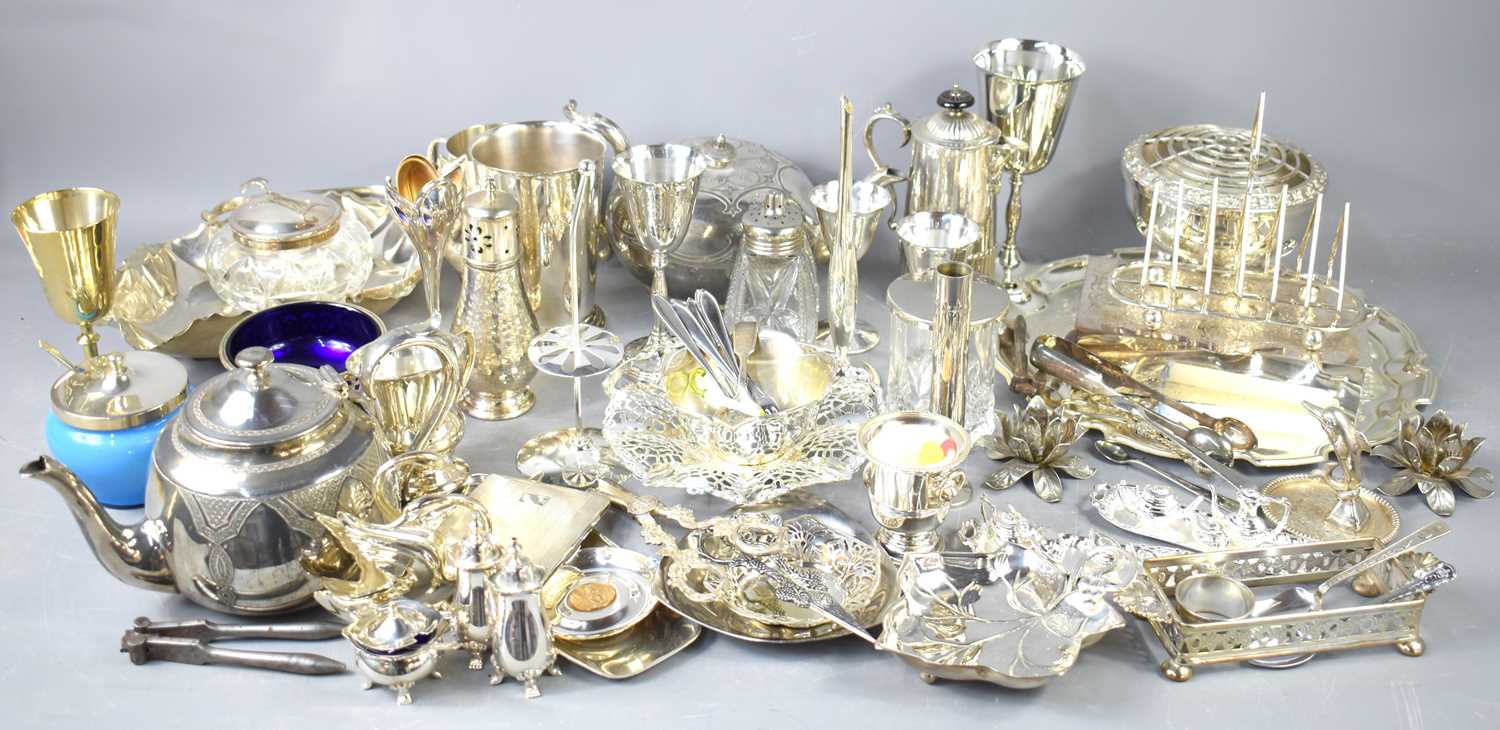 A large group of silver plate to include coffee pot, toast rack, teapot, tankard, rose bowl,