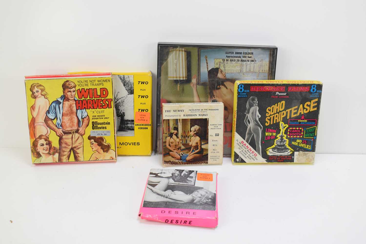 A group of vintage 8mm adult films.