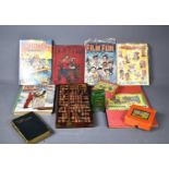 A group of vintage toys, and various vintage children's annuals and albums, comprising a wooden