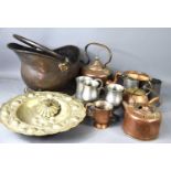 A group of pewter tankards, copper kettles, Askew copper tankard, coal scuttle and other items.