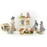 A group of boxed Royal Doulton and Lladro figurines to include Winnie the Pooh, Bramley Hedge,