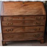 A 19th century Georgian mahogany bureau with fitted interior above four graduated drawers, 110cm