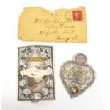 An 1864 Victorian Valentine's card, cut paper and paper lace, complete with original envelope.