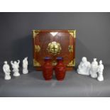 A Chinese table-top cabinet, together with a pair of cinnabar lacquer vases and a collection of