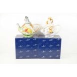 Two Border Fine Arts Disney teapots, Winter and Summer Pooh Betty teapots, both boxed.