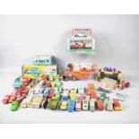 A group of vintage boxed and unboxed toy cars and planes, to include a Corgi Mercedes-Benz 240D &