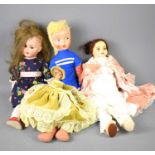 A group of vintage dolls to inlcude a German bisque head doll with jointed composition body, a wax