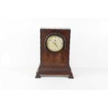 A vintage mahogany cased Synchron electric clock.
