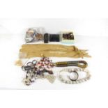 A group of vintage and designer costume jewellery including a David Detz zebra necklace and