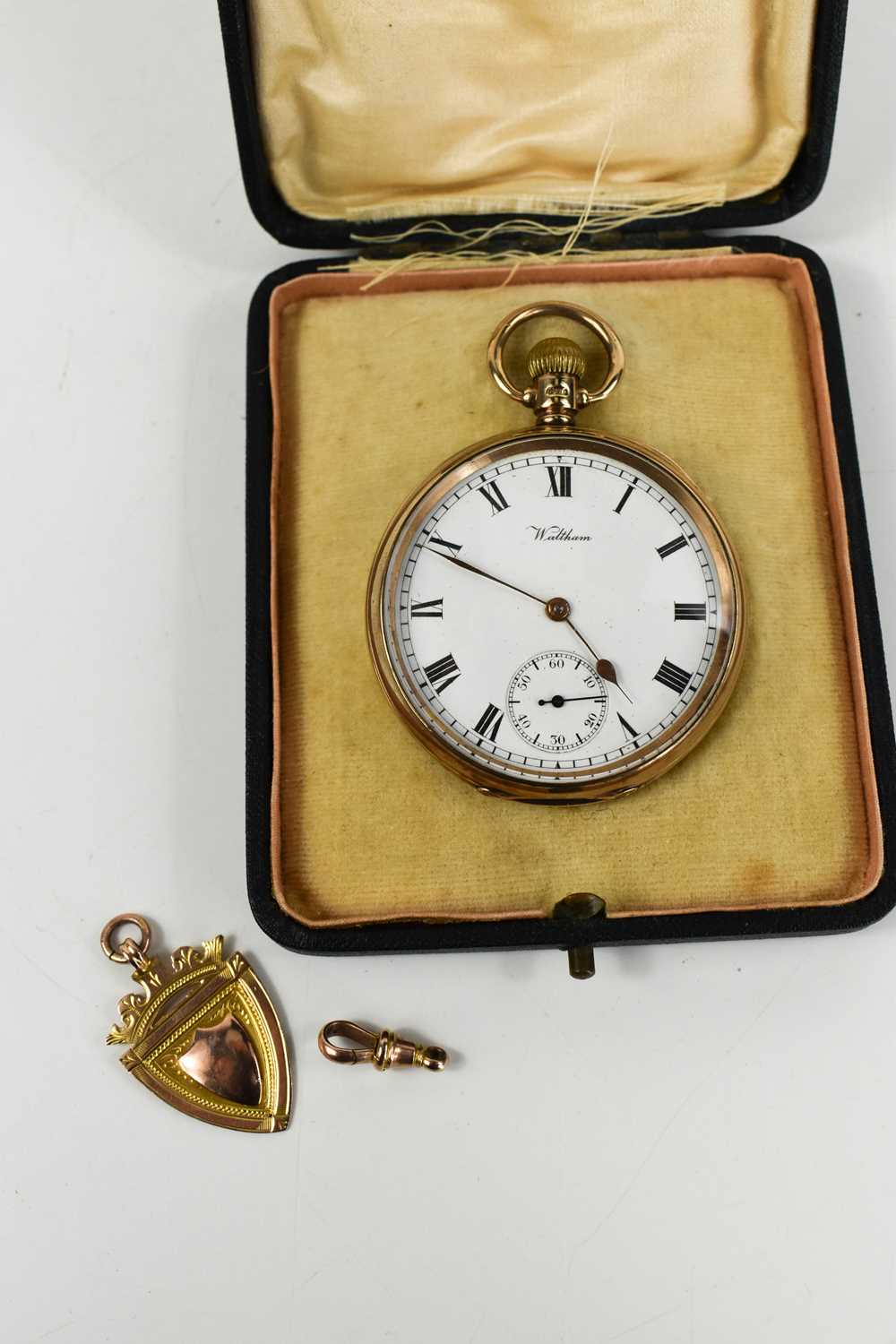 A 9ct gold open faced Waltham keyless wind pocket watch, with Roman numerals to the signed white - Image 2 of 2