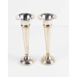A pair of sterling silver bud vases, weighted bases, 13cm high.