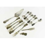 A part set of Dutch silver cake set, comprising cake slice, six silver spoons and forks, with
