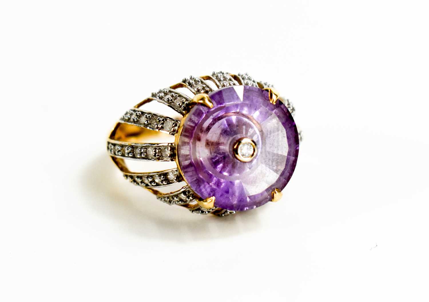 A Lehrer 9ct gold and Torusring amethyst and diamond ring, size O, 5.4g.